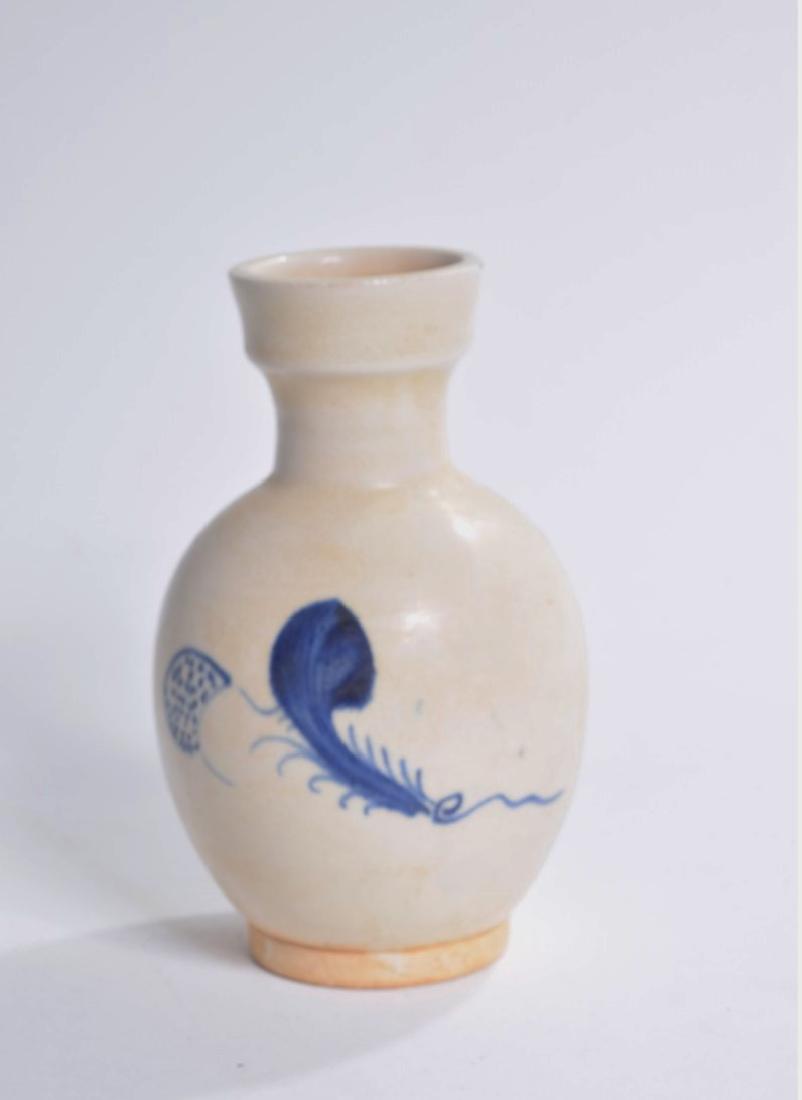 Pottery Vase with Blue Paint Decoration: the small vase with a stylized feather motif and blue paint incised Mark to bottom 6.5" x 4"