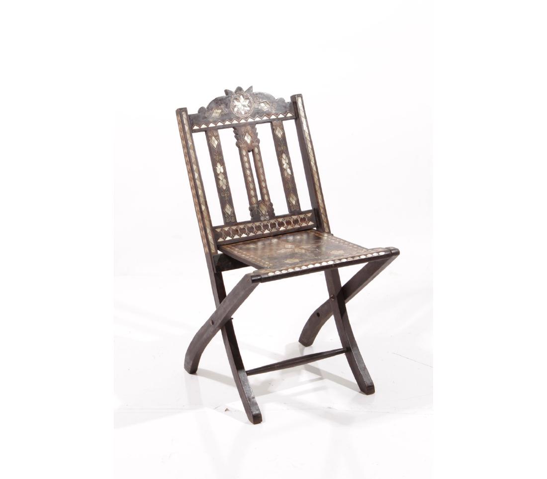 Syrian Folding Chair: Folding chair with Islamic motifs in mother of pearl inlay. 35 inches height, 20 inches width, 24 inches depth. 35"H x 20"W x 24"D