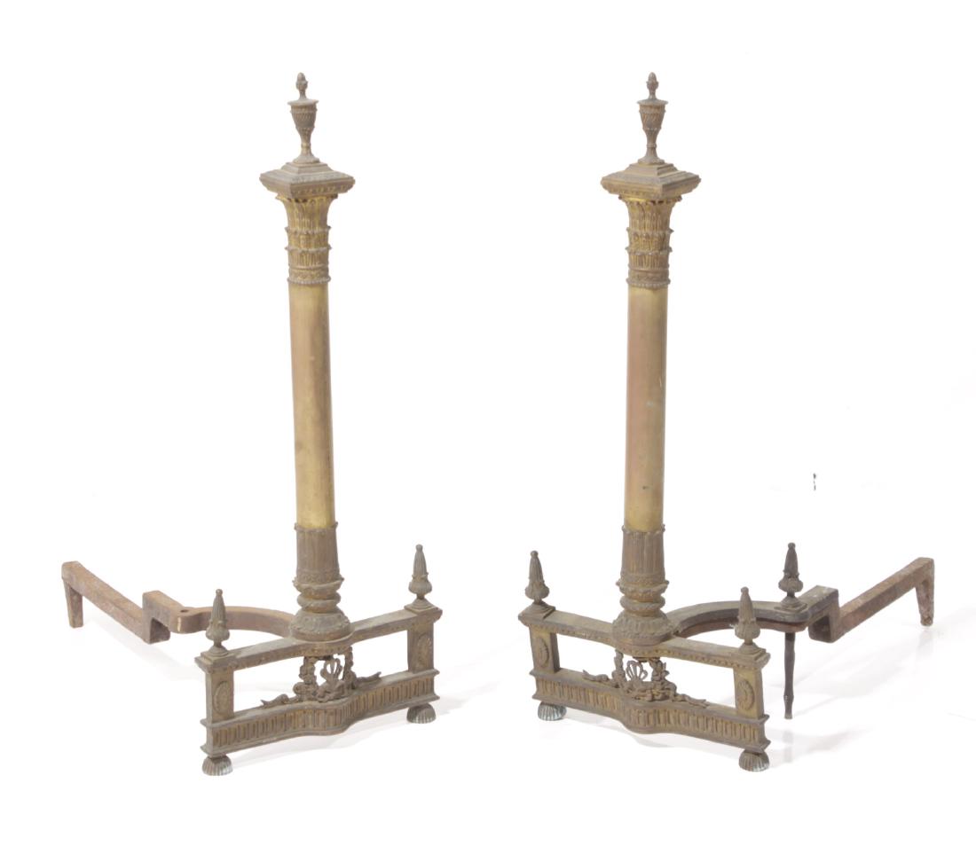 Pair of Andirons: 19th century. Brass with Corinthian capitals. 27 inches height, 11 inches width, 20 inches depth. 27"H X 11"W x 20"D
