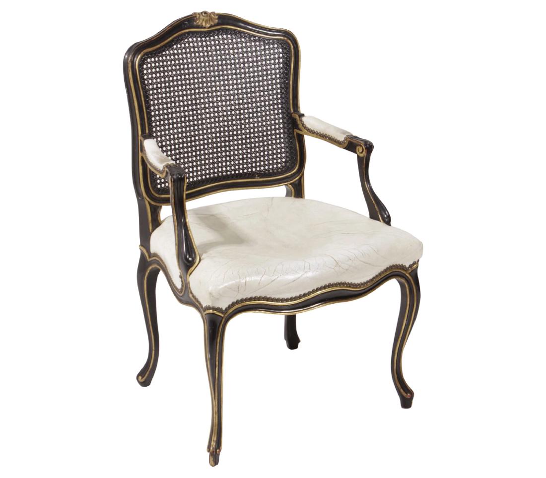 John Widdicomb Louis XV Style Fauteuil: 20th C. Ebonized. With gilt highlights, cane back and leather seat. 38"H x 24"W x 19"D