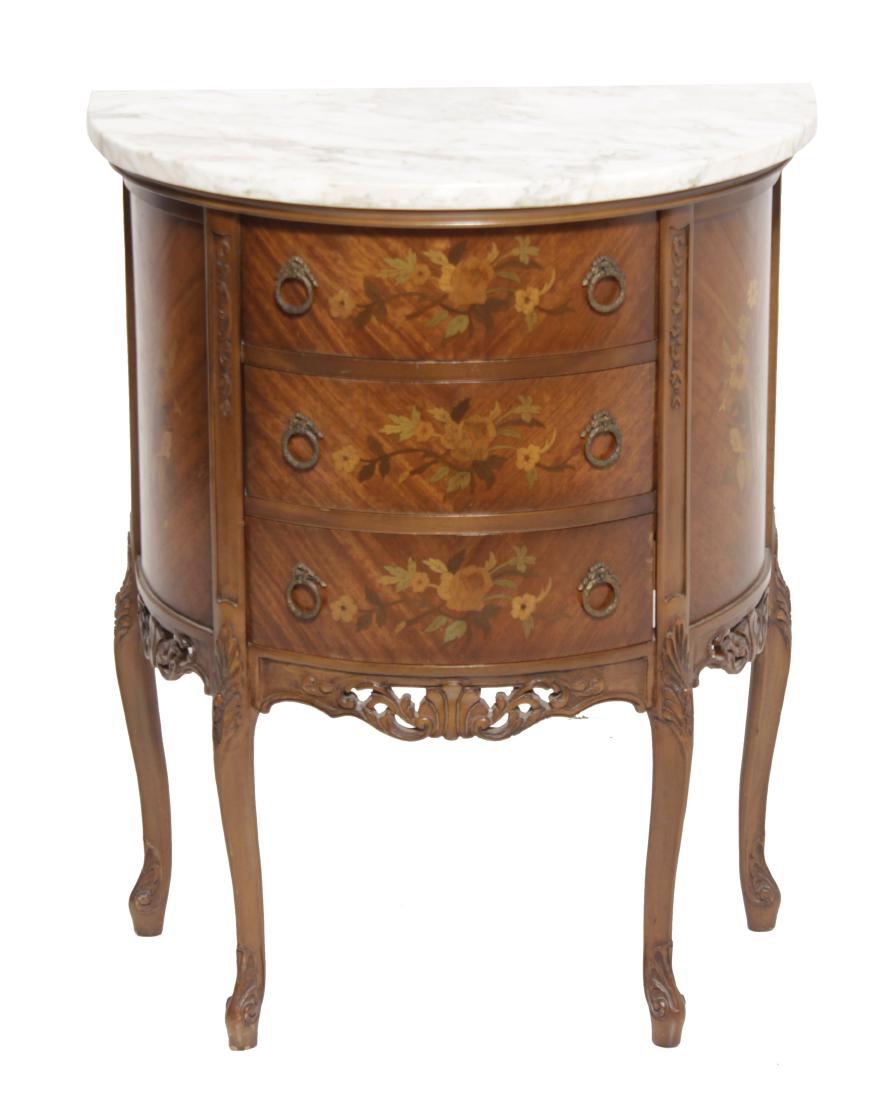 Louis XV style Diminutive Marquetry Commode: having a white marble top on a base fitted with three drawers. All with marquetry floral inlay. Early 20th century commensurate with age and use 30"H x 23.5"W x 13.75"D