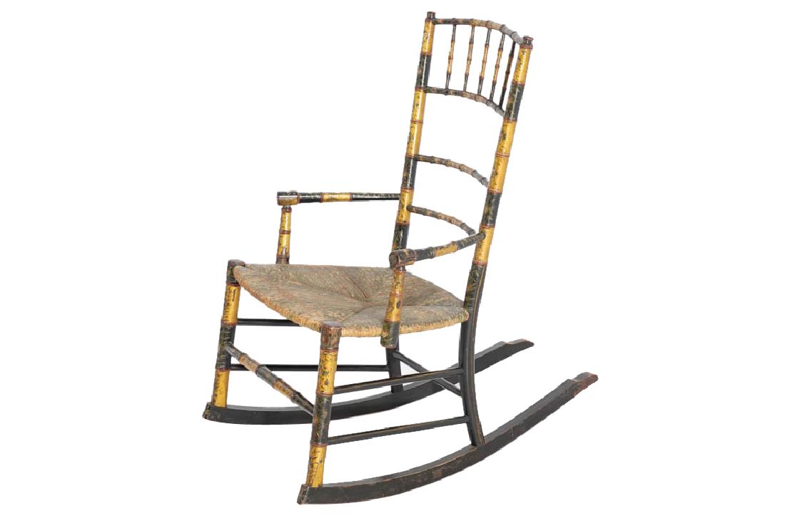 Early 19th C Victorian Childâ€™s Rocking Chair: Bamboo turned frame with Chinoiserie decoration. With rush seat. Good condition. 32" x 18" x 28"
