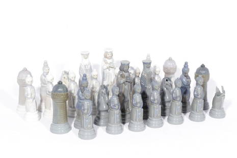 LLADRO Porcelain Chess Set: LLADRO Porcelain Chess Set, Circa 70's. Complete 32 pieces. One gray pawn broken, otherwise Good condition..