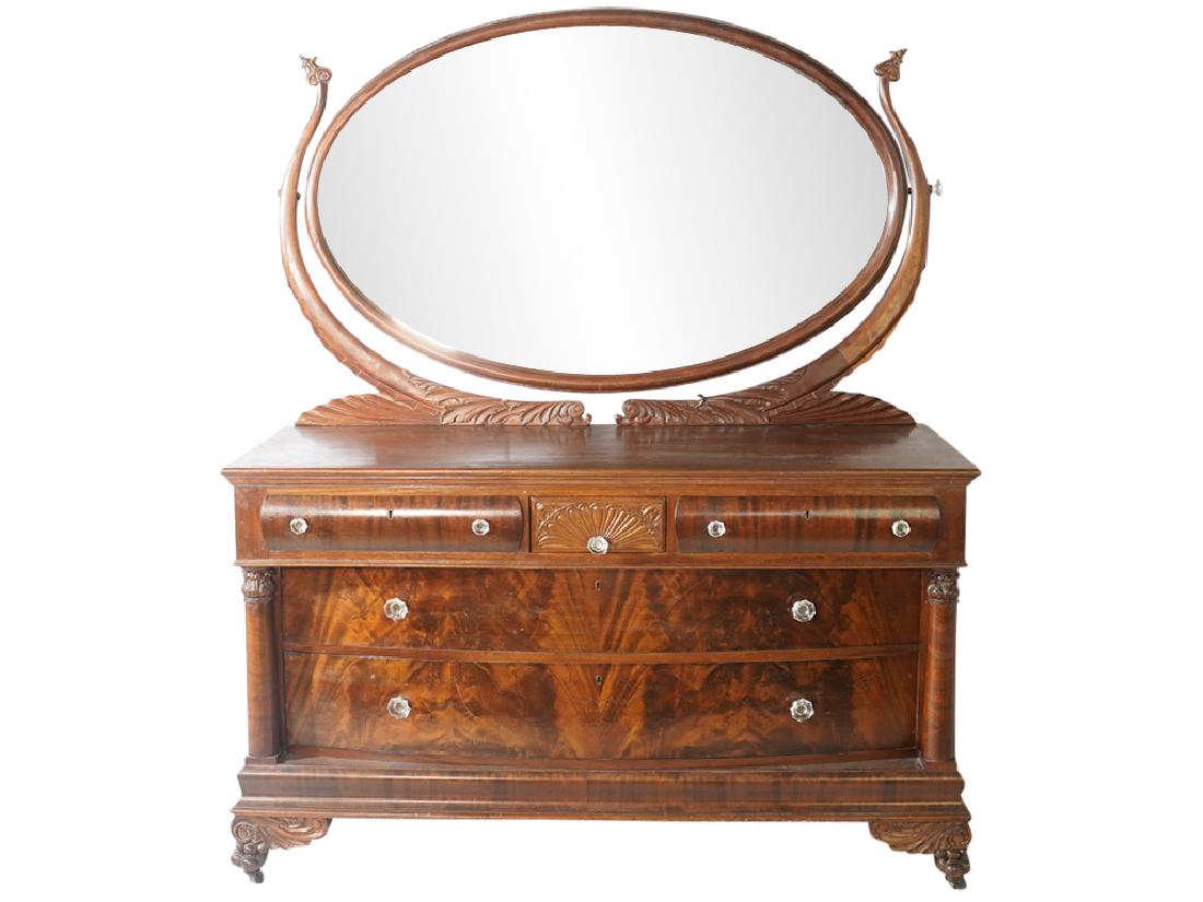 BERKEY & GAY Classical Revival Commode & Mirror: BERKEY & GAY Classical Revival Commode & Mirror, 20th C. Attached mirror with cornucopia frame, column stiles, two cushion drawers over two lower drawers. On paw feet. Good condition..75" x 62" x 28" 