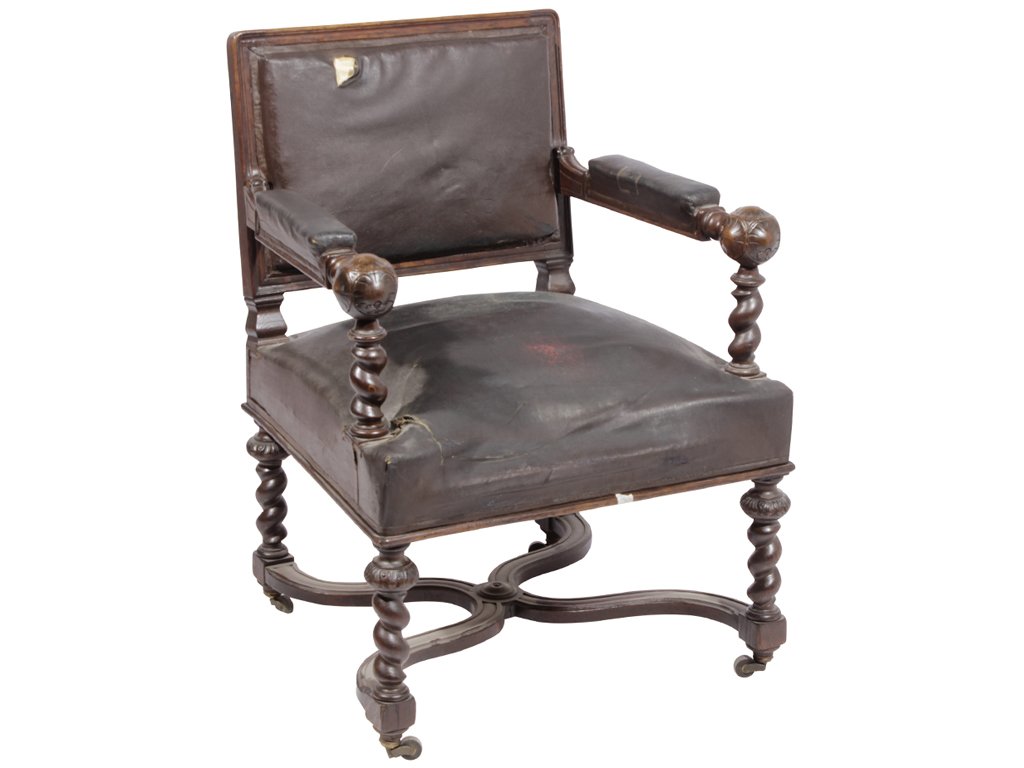Antique Italian Renaissance Style Armchair: Probably late 19th C. With twisted arms and leather upholstery; stretcher below.35"H x 26"W x 24.5"D
