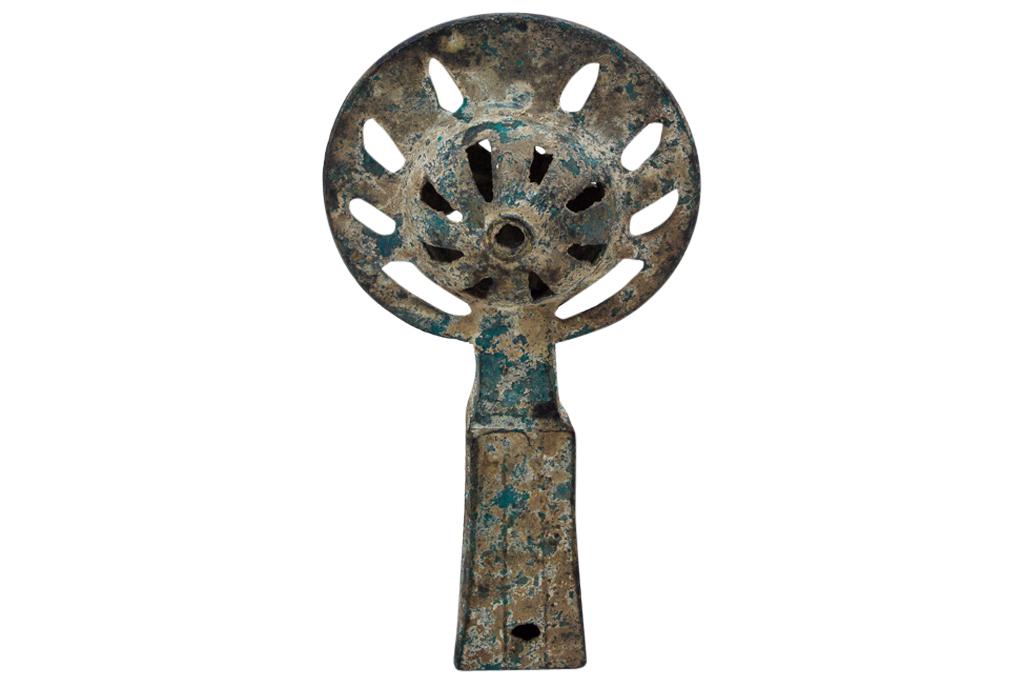 Bronze Age Antique Staff Topper: Rounded pierced design with bell at top w/square opening. 7"H x 4"W x 1"D Shows age and thick patina.