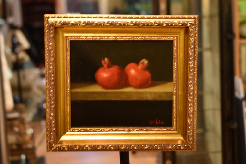Bert Beirne (American, 1939) "Two Pomegranates": OIl on panel. Still life depicting two pomegranates. Housed in a gilt frame. Signed lower right. Label on verso. Excellent condition. Artist bio: A native of Cincinnati, Ohio, Bert Received a BFA degr