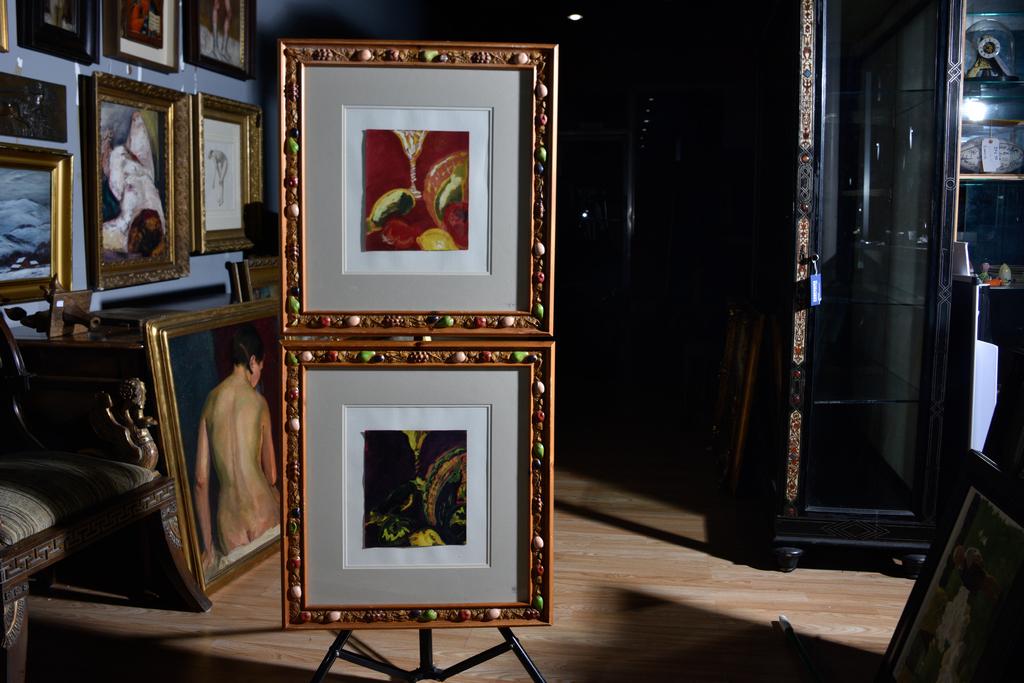 Louis Wolchonok ((American, 1898 - 1973): Pair, Gouche on paper. "Still life red". In custom hand painted and embellished frames. Signed lower left. Sight, 9.50"H x 8.50"W. Overall, 24"H x 23"W. Both works are signed.