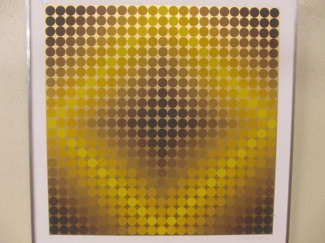 TWO VICTOR VASARELY (1906-1997) PRINTS: Two optical art prints. One having a series of gradient dots forming a diamond against a gold background. Artist's signature lower right. Numbered 168/200 lower left. The other print a series of verti