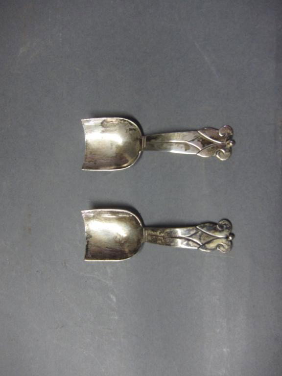 PAIR MEXICAN ARTS AND CRAFTS SUGAR SCOOPS:: 940 silver. Varying touch marks. 2.10 toz. 4.25"L each