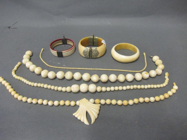 GROUP OF IVORY AND BONE JEWELRY:: comprised mostly of beaded necklaces and bracelets.