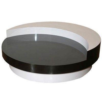 WILLY RIZZO REVOLVING COFFEE TABLE: for Mario Sabet, Italy, 1970s. Production version of the famous 1969 revolving table from Sebastien Barquet. Featuring a gloss lacquered black and white color combination, a crescent moon shaped upper