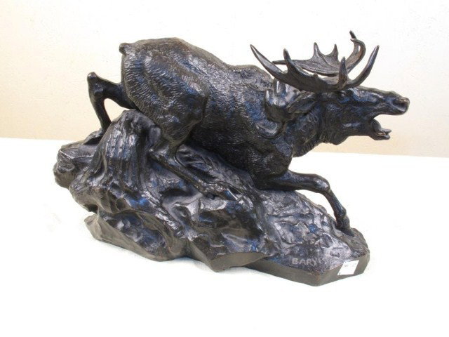 ANTOINE-LOUIS BARYE (FRENCH, 1796-1865):: A 19th century bronze sculpture of a moose being attacked by a mountain cat. Signed "Barye" on rocks, and bearing the "F. Barbedienne" foundry mark on base. Removed from storage Norwalk, CT