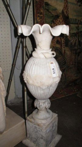 ALABASTER URN: Scrolled trumpet form rim with foliate carving. 27"H From a fine Buckhead residence