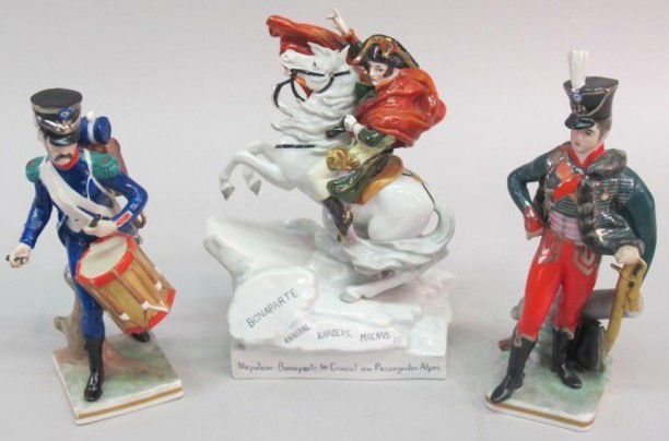 THREE PORCELAIN MILITARY FIGURES: Including Napoleon on horseback, and two standing military figures. One bearing the Capodimonte mark. Each 7.5"H approximately Provenance: The Ferst estate