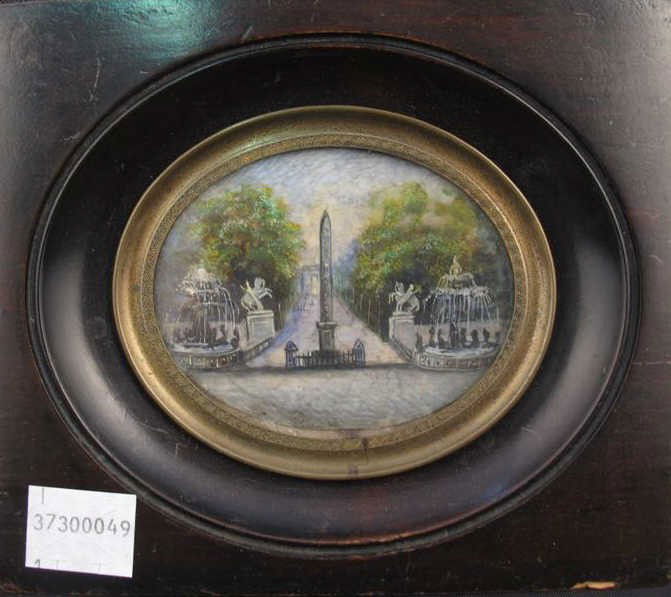 MINIATURE FRAMED WATERCOLOR: A charming oval miniature watercolor on paper depicting an obelisk and garden fountains and sculptures. Housed in a square wood frame with gilt oval border. 4.5"H X 2.5"L Provenance: The Ferst estate