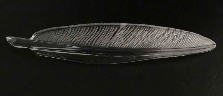 BACCARAT & THOMAS BASTIDE CRYSTAL PAPERWEIGHT: A quill form paperweight designed by Thomas Bastide for Baccarat. Bearing the Baccarat stamp, and signed and dated "Thomas Bastide, 1990." 10.5"L Provenance: The Ferst estate