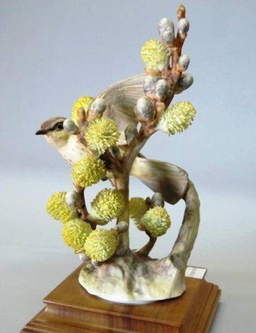 ROYAL WORCESTER - DOUGHTY "VERMILIAN FLY CATCHER":: A bird figure with pussy willow modeled by Dorothy Doughty. Accompanied with a fitted wooden base and box. 9.5"H Provenance: The Ferst estate