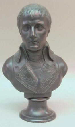 WEDGWOOD BLACK BASALT NAPOLEON BUST:: Circa 1882. Mounted atop a waisted circular column. Impressed Wedgwood mark to back. 8.5"H Provenance: The Ferst estate