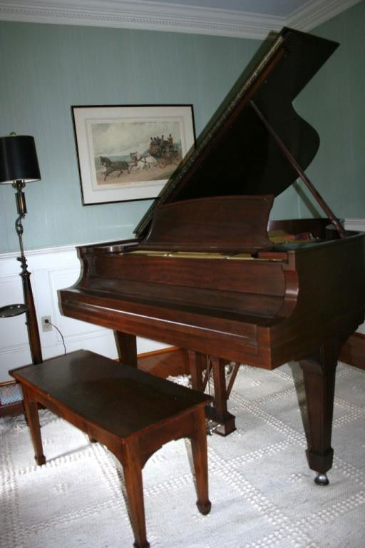 STEINWAY MODEL O GRAND PIANO: Mahogany case with bench. Serial number 198984.