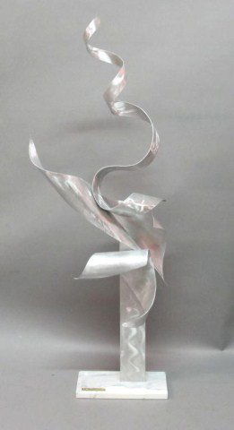 ALEX KOVACS CONTEMPORARY SCULPTURE:: A contemporary sculpture of twisted brushed aluminum, mounted on a white marble base. Signed on base. 44"H