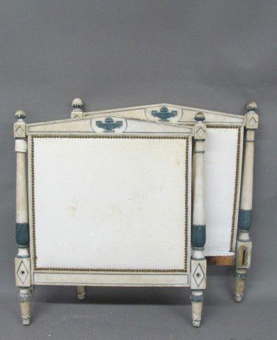 CARVED CLASSICAL STYLE DAY BED:: In white and blue paint decoration, with blue urns at the crests. The headboard and footboard with brass studded white upholstery. Together with matching bed rails, mattress, and light green damask up