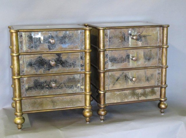 PAIR MIRRORED NIGHT STANDS:: Mid 20th c. A pair of gilt nightstands, each fitted with three mirrored drawers and having mirrored surfaces and sides. 25"H X 15"D X 20"W