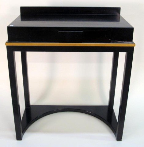 ELIEL SAARINEN BLACK LACQUER CONSOLE TABLE:: Designed by Finnish American architect, Eliel Saarinen. Note: Veneer lifting and lacquer losses at the apron. Some wear to the surface. 37.5"H X 16.5"D X 32.25"W