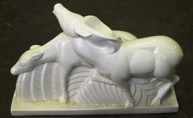 CHARLES LEMANCEAU (FRANCE, 1905-1980): An Art Deco sculpture depicting two deer.