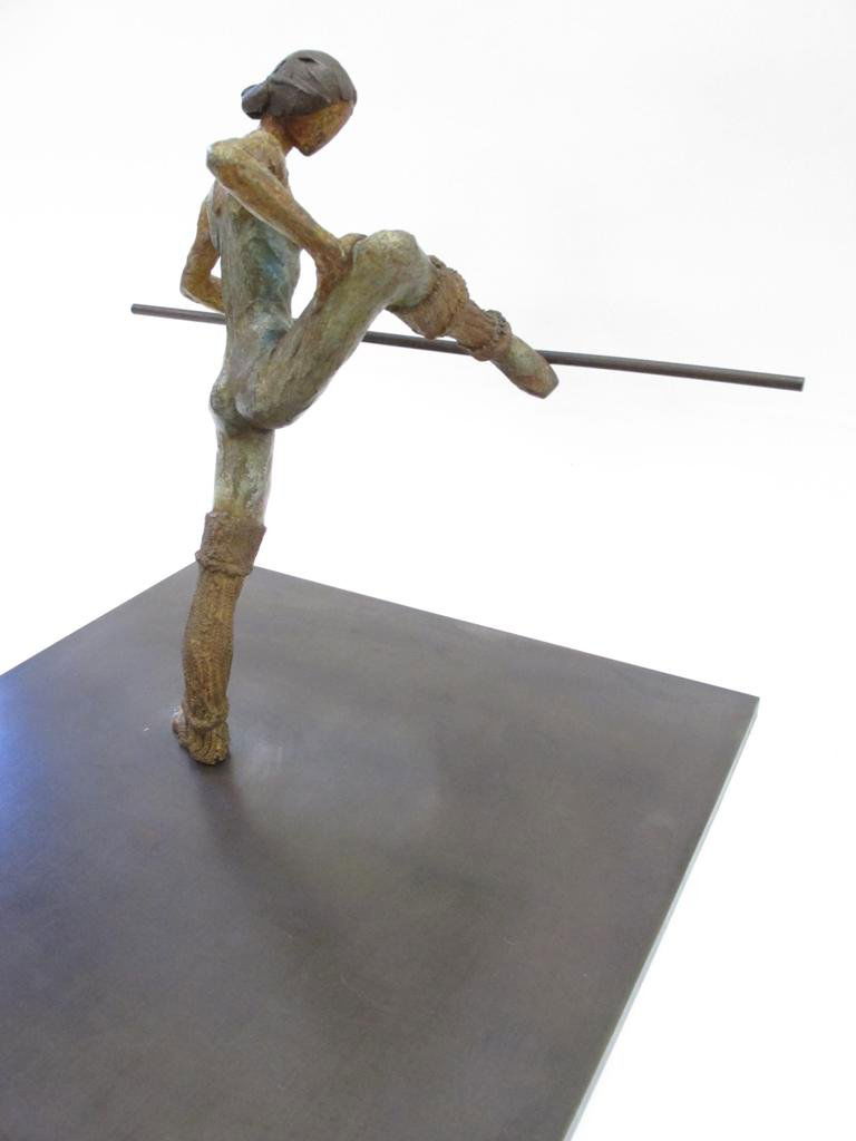 AL FARROW (AMERICAN, B. 1943: Bronze sculpture in multiple patinas depicting a ballerina with leg raised at balance bar. Signed at side of steel base, "Al Farrow A/P 1981". Figure measures 12.5"H. Base measures 14.75" X 14.75".