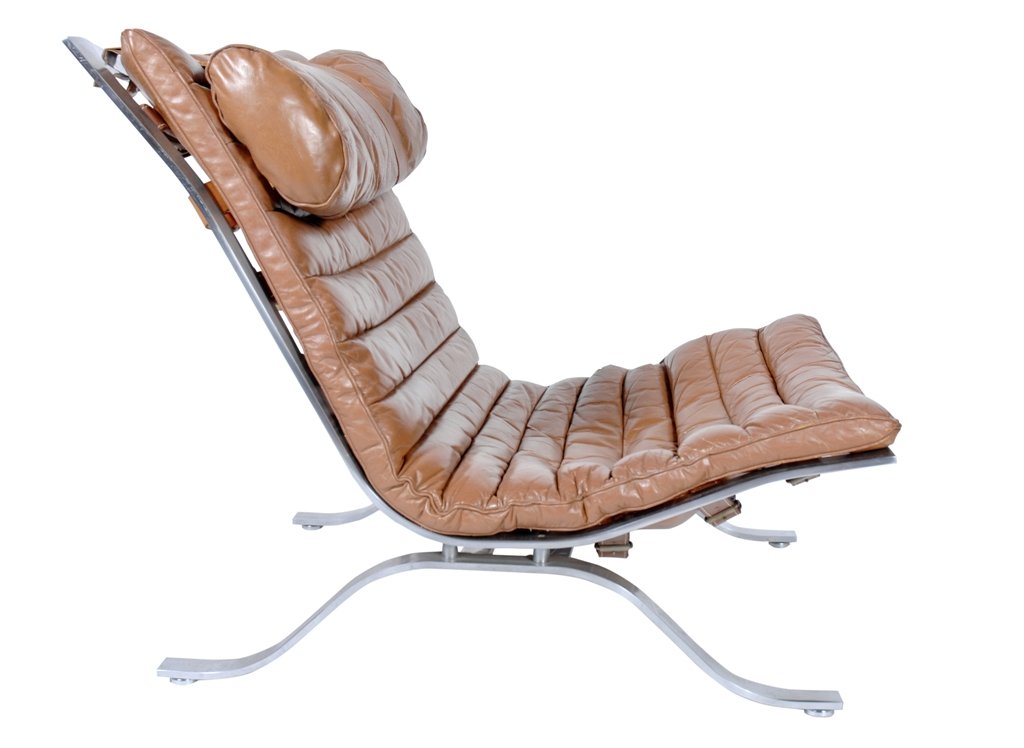 ARNE NORELL "ARI" VINTAGE LEATHER LOUNGE CHAIR: Circa 1970. Original brown leather cushions with original leather straps on stainless steel frame. Good vintage condition. 31"H