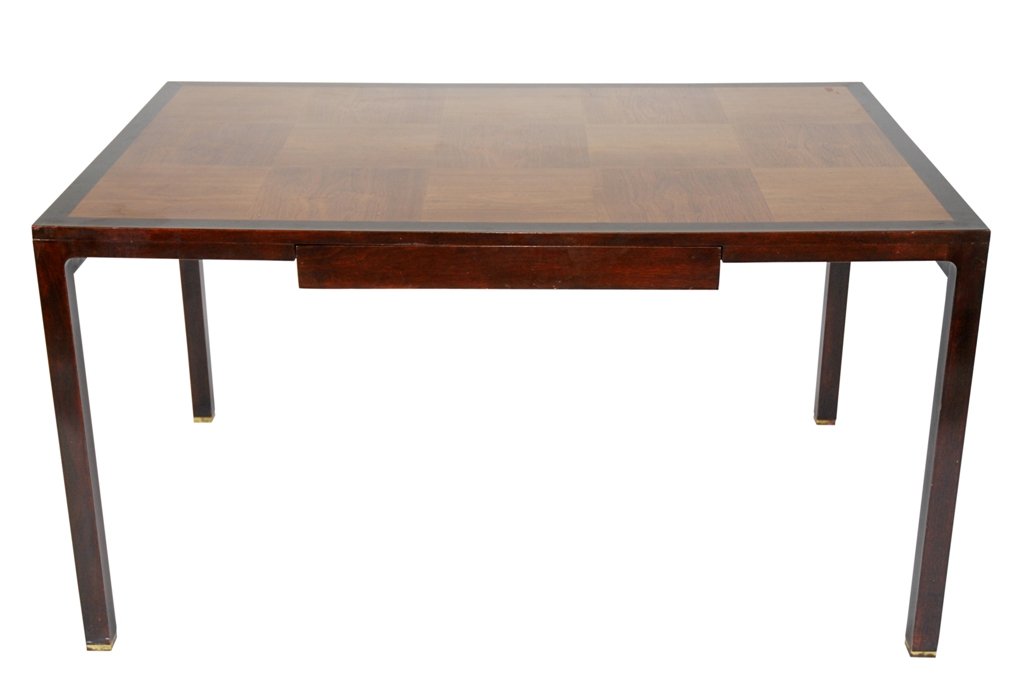 ED WORMLEY FOR DUNBAR MID CENTURY DESK: Two tone wood construction with laminate top writing desk, fitted with one drawer, with Dunbar manufacturer. Very good condition. 29"H X 33.75"D X 54"W