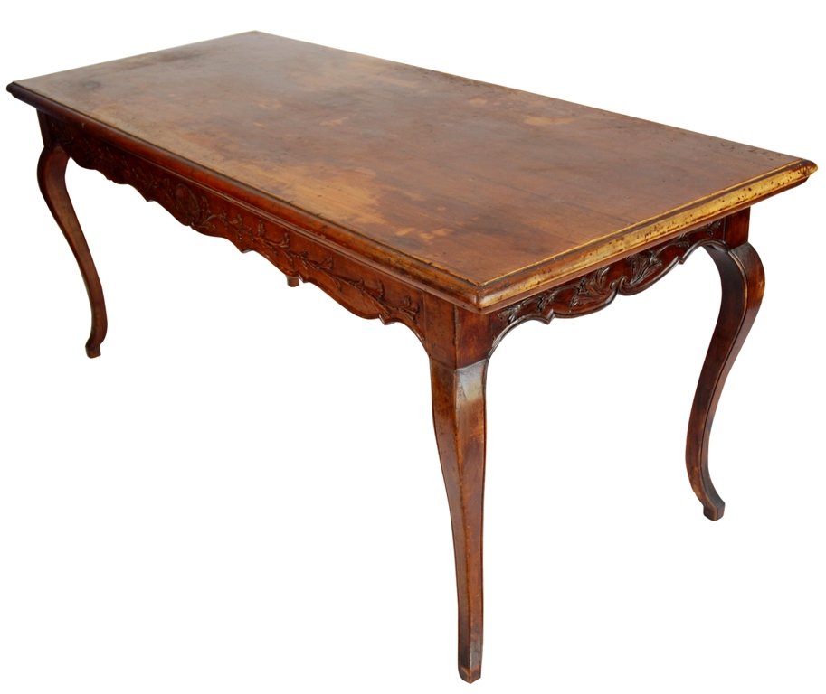 ANTIQUE FRENCH PROVINCIAL OAK DINING TABLE: A rectangular surface over a carved and shaped apron with shell and foliate decoration, all raised on cabriole legs. Wear to surface and edges. 30"H X 29.5"D X 71"W