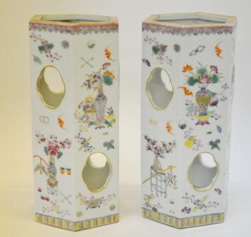 PAIR CHINESE CHIA-CH'ING STYLE PORC. WIG STANDS:: of hexagonal form, having alternating floral and foliate decoration on a white ground, the underside with spurious Chia-Ching mark. Height 11 1/4 inches.