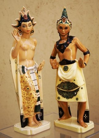 PAIR OF ITALIAN BIGI, TORINO CERAMIC FIGURES:: Depicting a Balinese female and male dancer in traditional ceremonial attire, raised on rectangular plinths. 18"H Tallest, marked on base, and numbered 9524.