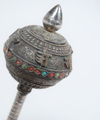 CHINESE SILVER OBJECT:: With beaded turquoise and coral and applied silver decoration. Chinese character marks.