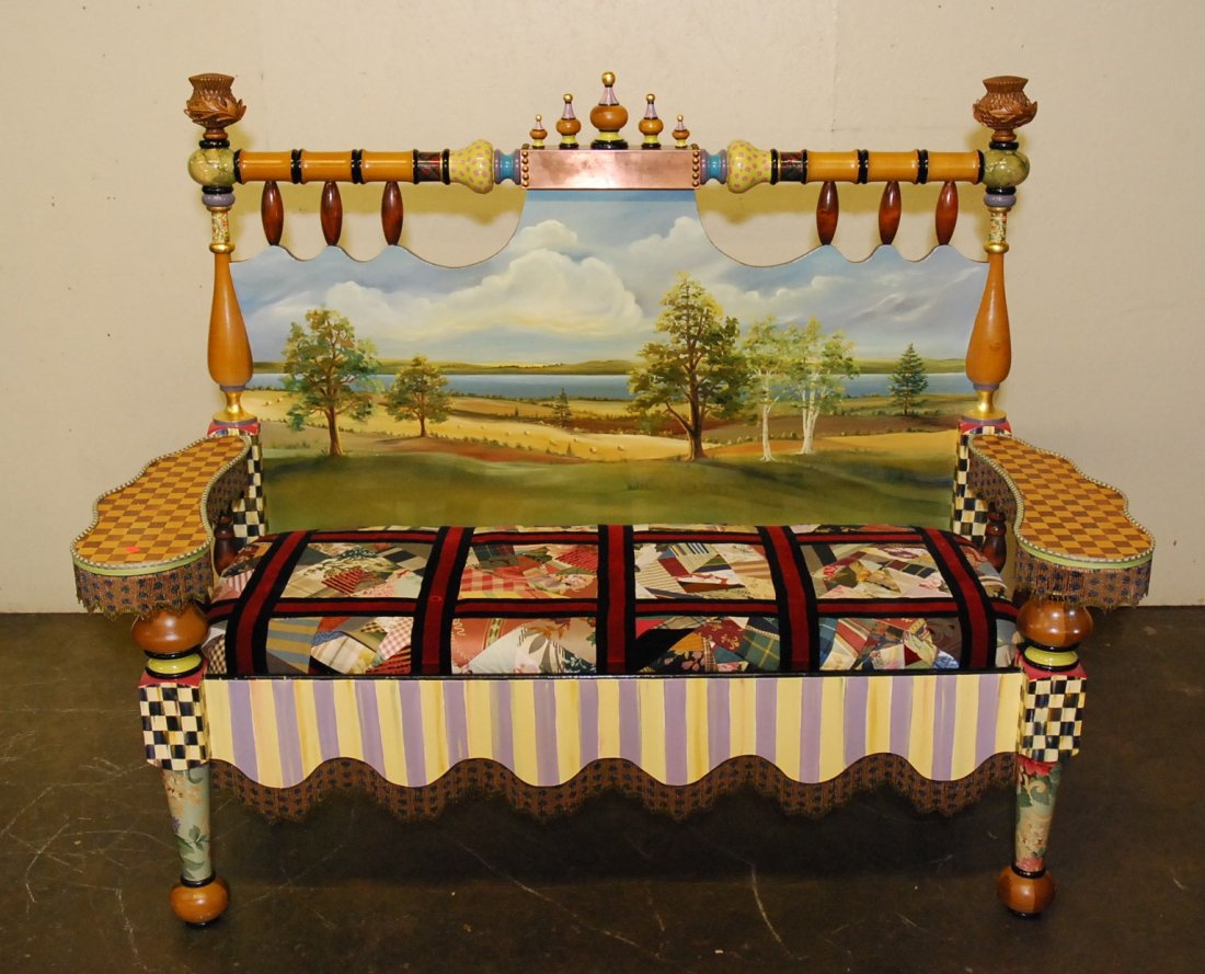 MACKENZIE-CHILDS SETTEE: The panel back with hand painted landscape decoration supported by a wood turned work frame, with finials. All with applied beaded French work. 51" H x 62" W x 27" Deep