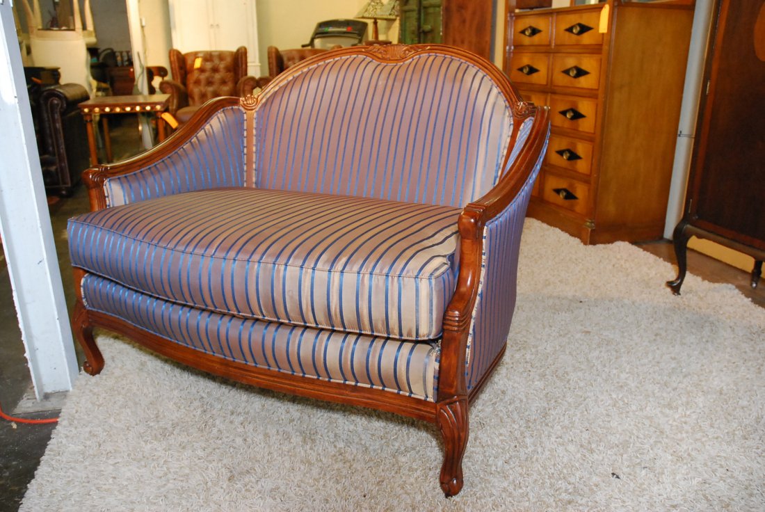 CARVED WOOD AND STRIPPED UPH SETTEE BY FAIRFIELD: 38"H X 47"W