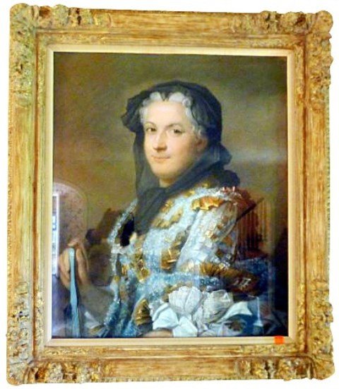 CHANPNEY, JAMES WELLS (1843-1903, American): 19TH Century pastel on paper portrait of Marie Leczinska wearing a black bonnet and holding a closed blue fan. Unsigned. Mounted in an elaborate carved, gesso and gilt molded frame. Bears labels on ve