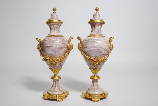 PR MARBLE ORMOLU MOUNTED CASSOLETTES: Pair of fine rose marble and gilt bronze mounted cassolettes in the Louis XVI Style. Late 19th to early 20th Century 19"H X 6.5" Diam. Provenance: From a fine Roswell, Georgia residence.
