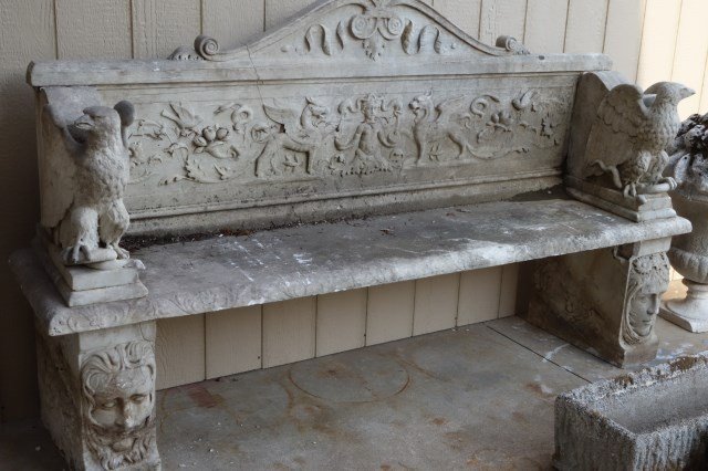 GARDEN BENCH: 19th Century fine and elaborate carved white marble estate garden bench. The atrium form back above an opposing twin gridding frieze center by full figural eagle arms resting on serpents. Measures: 83