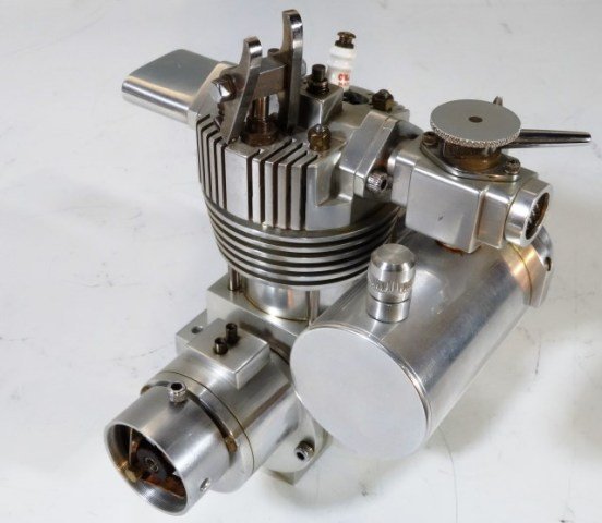 CARL ROBY WORKING MODEL GASOLINE ENGINE: Hand milled to scale in aluminum. Single Cylinder. 6"H X 6"W X 3 1/2"D