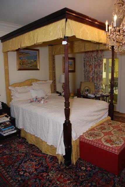 FOUR POSTER BED WITH CANOPY: Mahogany four poster bed with carved and fluted posts. 94" H with Interior bed rails 82"L X 53 3/4" W