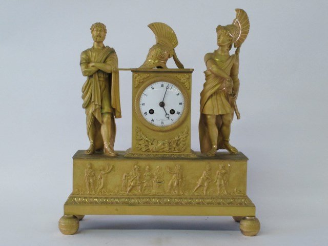 FRENCH GILT BRONZE MANTEL CLOCK: Classical motif with philosopher and warrior. Classic frieze on base set on four ball feet. Porcelain dial marked Leroy Palais Royal No 114. 16" H X 13 1/4"W X 4 1/2" D Note: No back panel. No Pendulu