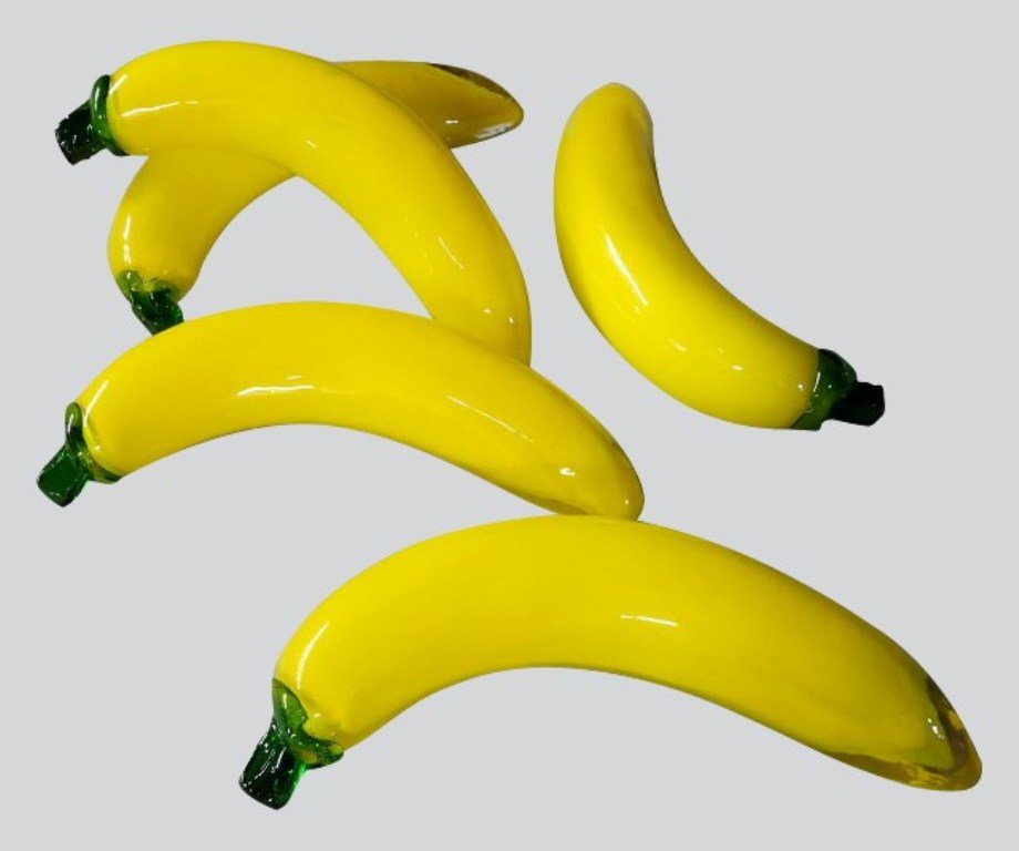 NELSON LEIRNER (BRAZIL, b, 1932): Five Bananas, No Date. Comprising a group of five realistic glass bananas. Length of longest 7 1/2 inche Provenance: Roebling Hall Galleries via storage unit purchases by Joe Pauletich of A&E network