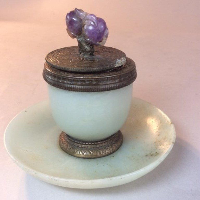 JADE INKWELL WITH AMETHYST: Amethyst finial on hinged bronze lid. Bronze marks. Note: loose hinge. 4"H X 4 1/2"D