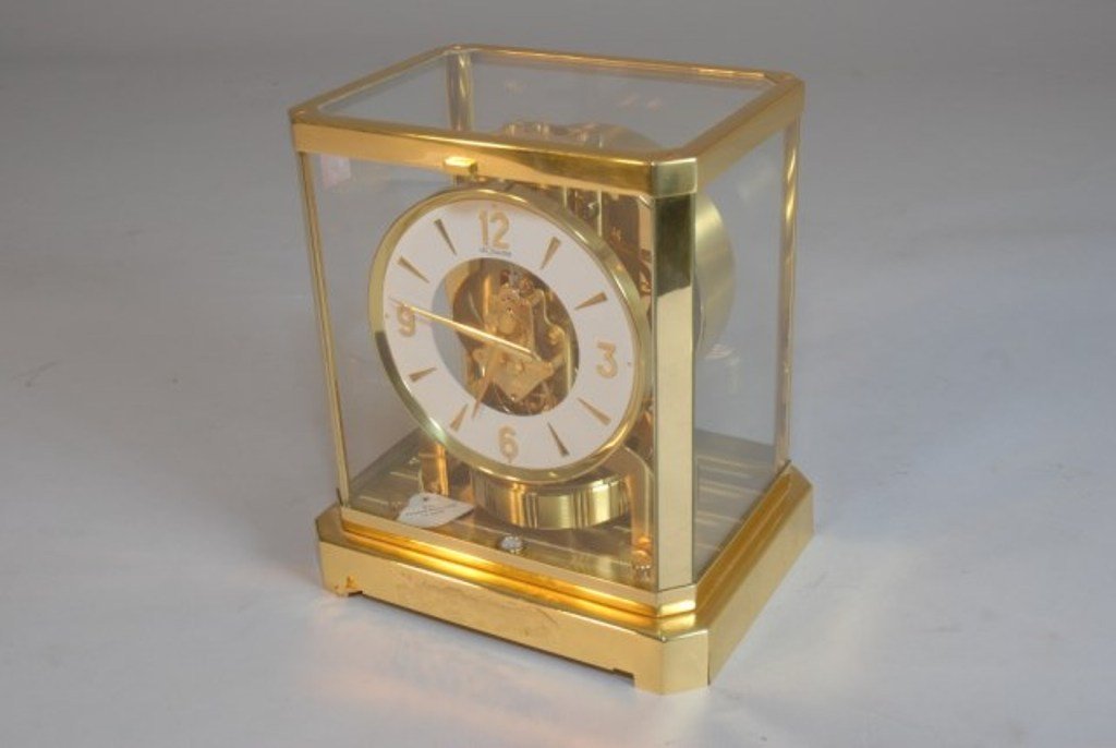 ATMOS LE COULTRE CLOCK: Mid 20th Century brass cased. Good condition. 9 1/4"H X 8 1/3"W X 7 1/3"D