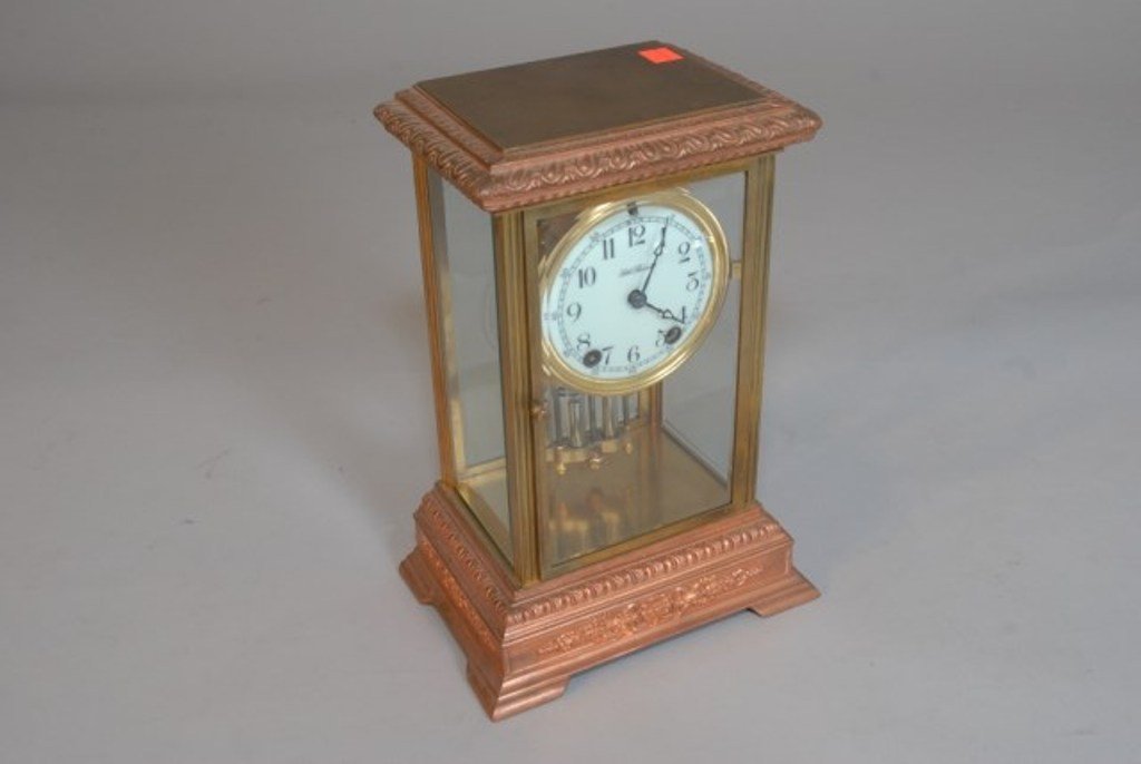 SETH THOMAS MANTLE CLOCK: Late 19th Century. Copper and brass framework case, small crack to the lower corner of the back door glass panel. Coil chime. 12"H X 8 1/2"W X 5 3/4"D