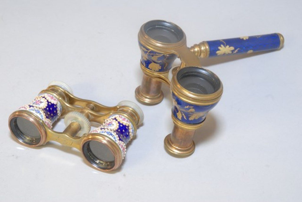GROUP OF FOUR PAIRS OF FRENCH OPERA GLASSES: France, 19th Century. Comprising two with painted enamel floral and foliate decoration, one with mother of pearl and one with raised embossed decoration of birds. Each in overall good stable condition