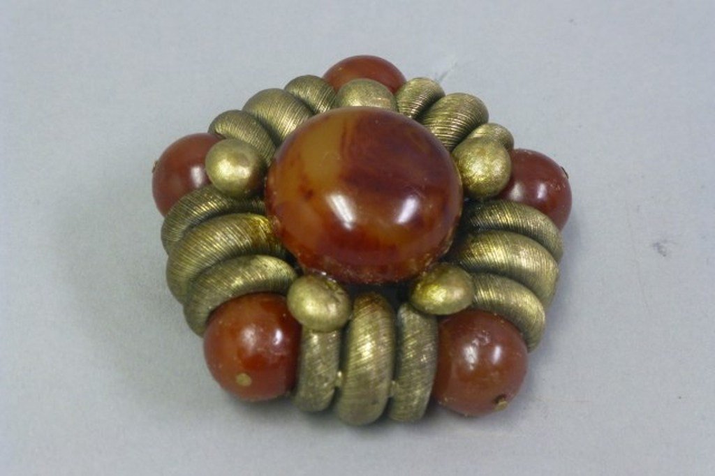 HATTIE CARNEGIE BROOCH: Costume depicting tortoise and silver metal.